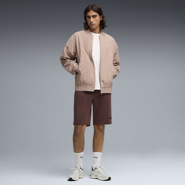 PUMA Regular Sportbroek 'Essentials No. 1' in Bruin