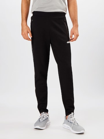 ELLESSE Tapered Workout Pants 'Diruta' in Black: front