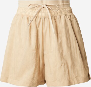 Nike Sportswear Loosefit Housut värissä beige: etupuoli