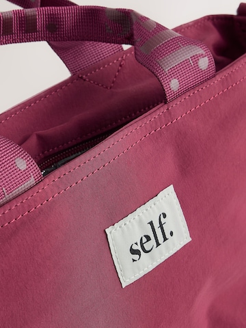 Borsa a mano di self. in rosso