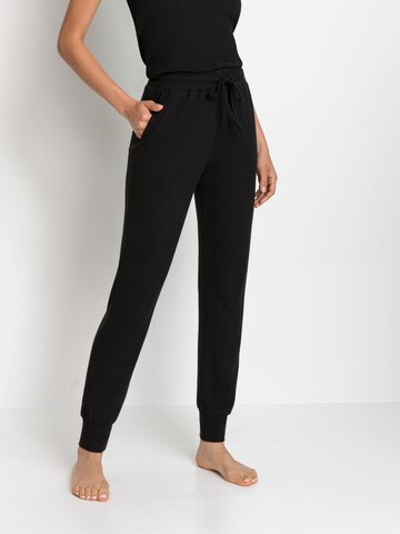 LASCANA Tapered Pants in Black: front