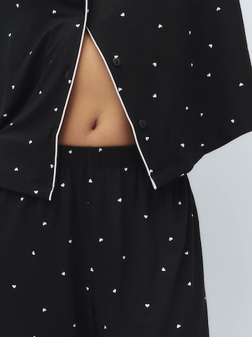 Pigiama di Marks & Spencer in nero