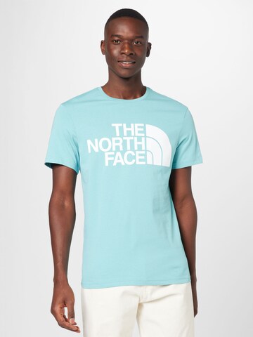 THE NORTH FACE T-shirt i blå: framsida