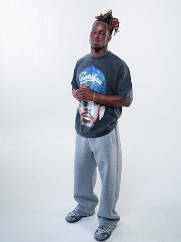 T-Shirt 'NIPSEY HUSSLE TEE' ATELIER OF FAITH en gris