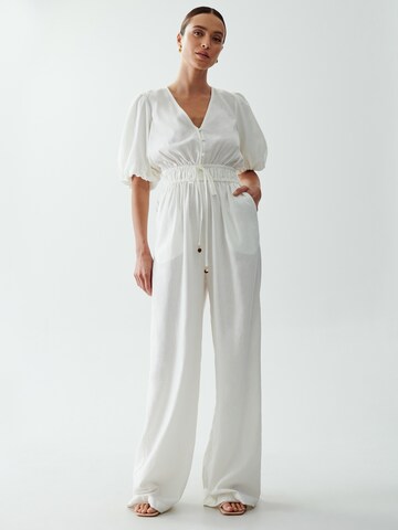 The Fated Jumpsuit 'PROUD' in White: front