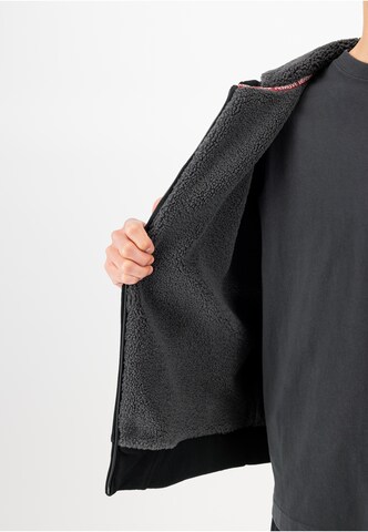 Veste de survêtement ALPHA INDUSTRIES en noir