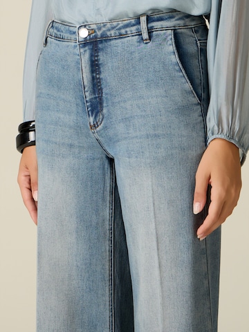 évasé Jean oltre en bleu