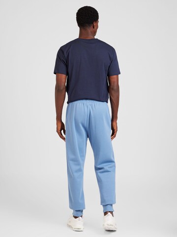 Effilé Pantalon Champion Authentic Athletic Apparel en bleu