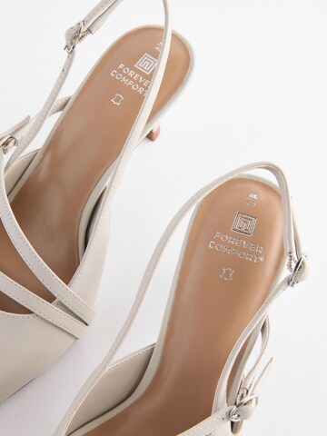 Décolleté sling di Next in beige