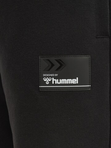 Effilé Pantalon Hummel en noir