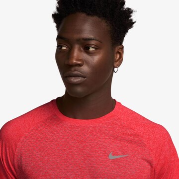 NIKE Performance Shirt 'DFADV STRIDE' in Orange