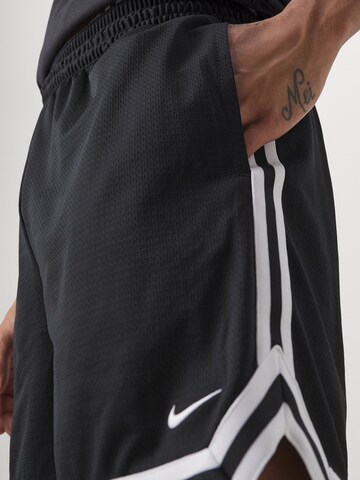 Loosefit Pantalon de sport Nike Sportswear en noir