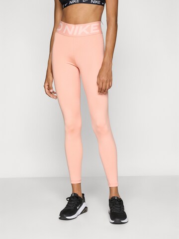 oranžinė NIKE Siauras Sportinės kelnės: priekis