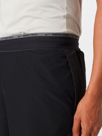 NIKE - regular Pantalón deportivo en negro