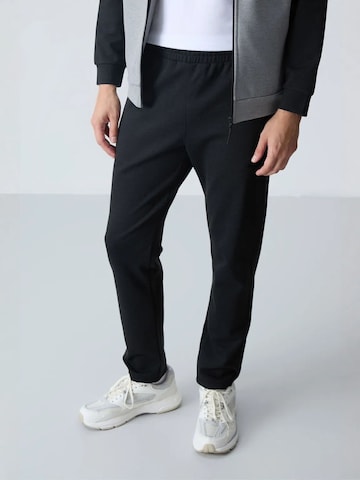 Survêtement 'Aktive Sets' Tommy Life en mélange de couleurs