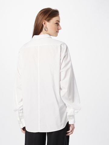 3.1 Phillip Lim - Blusa en blanco