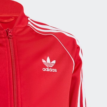 ADIDAS ORIGINALS - Regular Casaco meia-estação 'Adicolor Sst' em vermelho