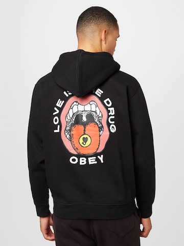 Sweat-shirt 'Love Is The Drug' Obey en noir
