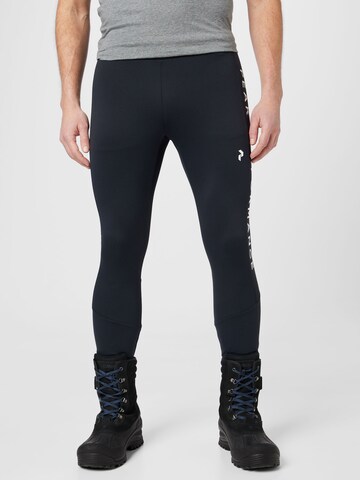 PEAK PERFORMANCE Skinny Sports trousers 'Rider' in Black: front