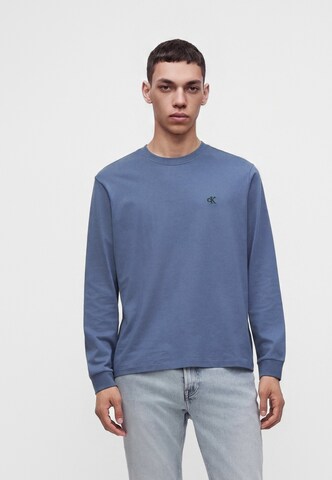 Tricou de la Calvin Klein Jeans pe albastru: față