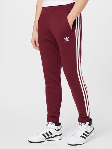 ADIDAS ORIGINALS Slimfit Hlače 'Adicolor Classics' | rdeča barva: sprednja stran