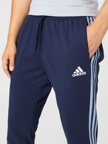 mėlyna ADIDAS SPORTSWEAR Siaurėjantis Sportinės kelnės 'Essentials Mélange French Terry'