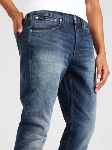 Calvin Klein Jeans Zúžený strih Džínsy 'SLIM TAPER' - Modrá