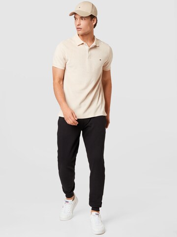 TOMMY HILFIGER Poloshirt in Beige