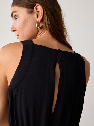 Combinaison Next en noir