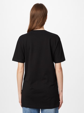 Merchcode T-shirt 'Girls Win' i svart