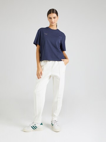 Tapered Pantaloni sportivi di HOKA in bianco