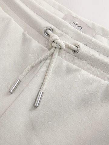Next regular Bukser i grå
