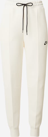 Tapered Pantaloni de la Nike Sportswear pe bej: față