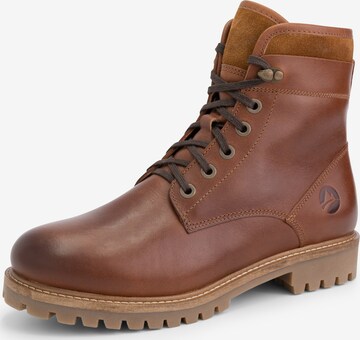 Travelin Lace-Up Boots in Brown: front
