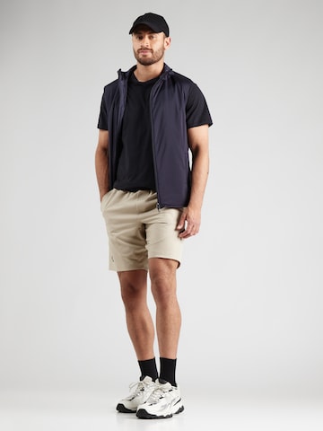 regular Pantaloni sportivi 'Unstoppable' di UNDER ARMOUR in verde