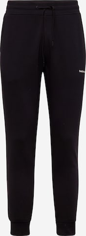 Effilé Pantalon PEAK PERFORMANCE en noir : devant