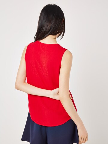Chemisier Apricot en rouge