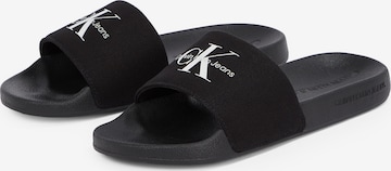 Calvin Klein Jeans Pantofle – černá: přední strana