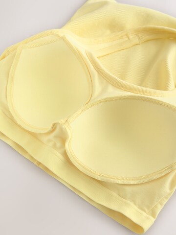 Next - Top en amarillo