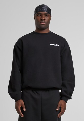 Karl Kani Sweatshirt 'Woven Signature Resist Love Crew' in Zwart