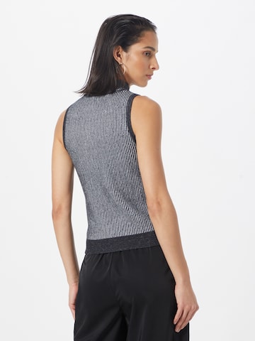 Tops en tricot DKNY en noir