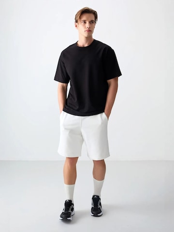 Tommy Life T-Shirts in Schwarz