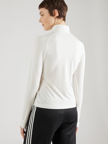 T-shirt fonctionnel 'City Escape' ADIDAS SPORTSWEAR en blanc