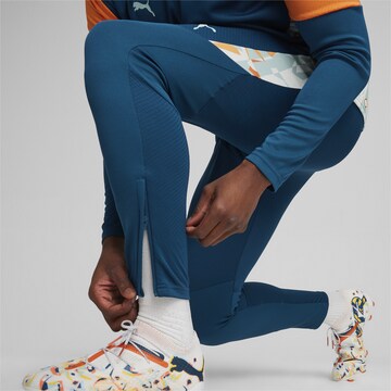 PUMA Tapered Sportbroek 'Neymar JR Creativity' in Blauw