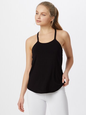 CURARE Yogawear - Top deportivo en negro: frente