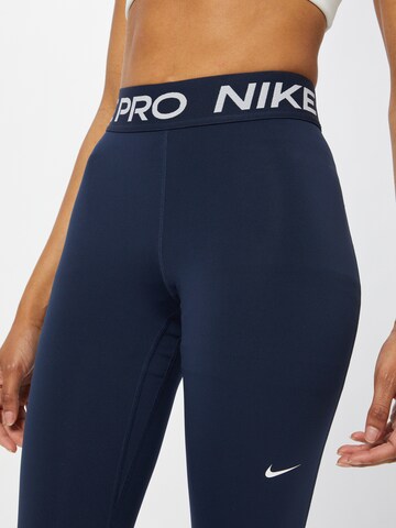 NIKE Skinny Sporthose in Blau