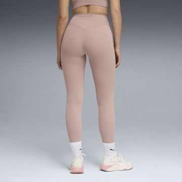PUMA Skinny Sports trousers in Beige