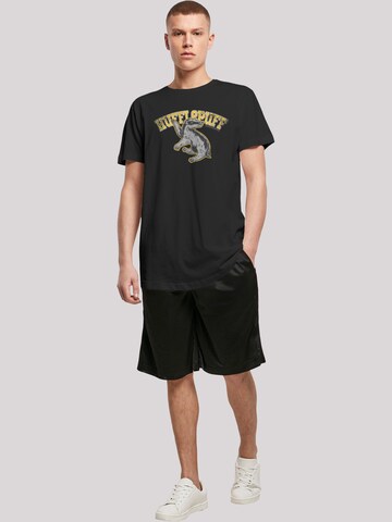 Maglietta 'Harry Potter Hufflepuff Sport Emblem' di F4NT4STIC in nero