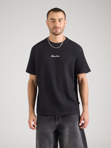 T-Shirt GUESS JEANS en noir : devant