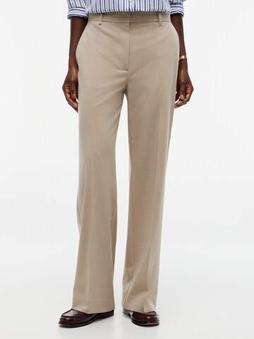 TOMMY HILFIGER - Bootcut Pantalón de pinzas en beige: frente